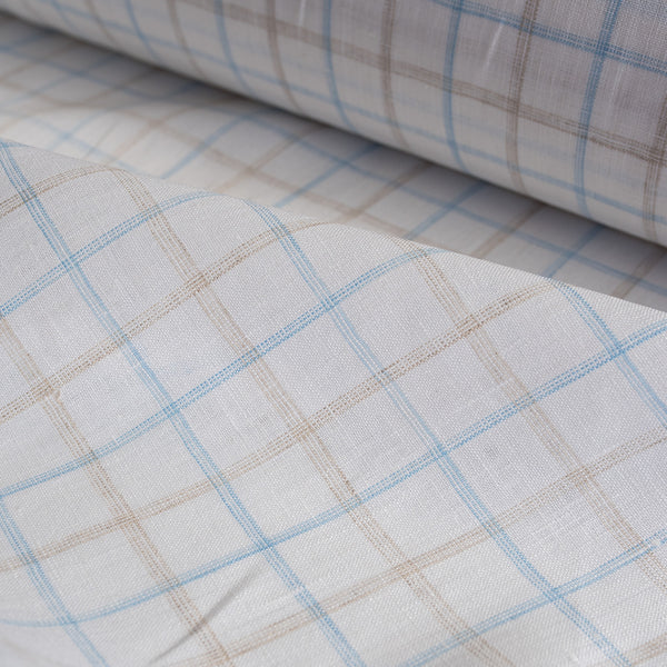 Yarn-dyed check pattern linen fabric in earth and sky hues, ideal for elegant and natural clothing.
