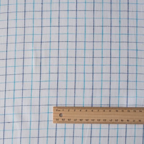 Summer Blues Check 100% Linen Fabric featuring fine blue checks on a white background, ideal for a variety of summer garments