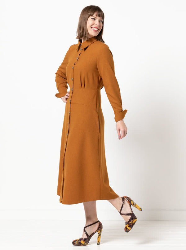Sophisticated Christina Woven Dress pattern with long sleeves, turn back cuffs, and a mid-body fitted yoke, designed for a refined look