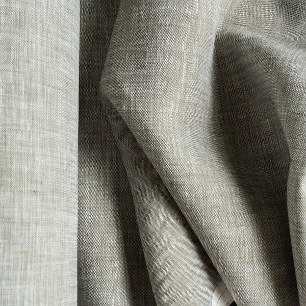 Subtle green and white blended linen fabric, perfect for creating sophisticated and airy garments.