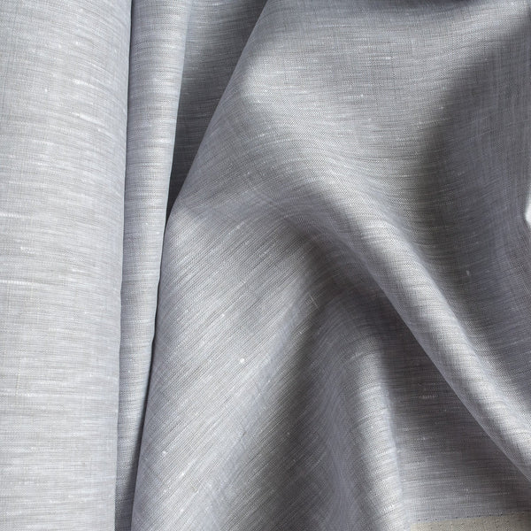 Chambray wave linen fabric with subtle slubs and a balance of grey and white threads