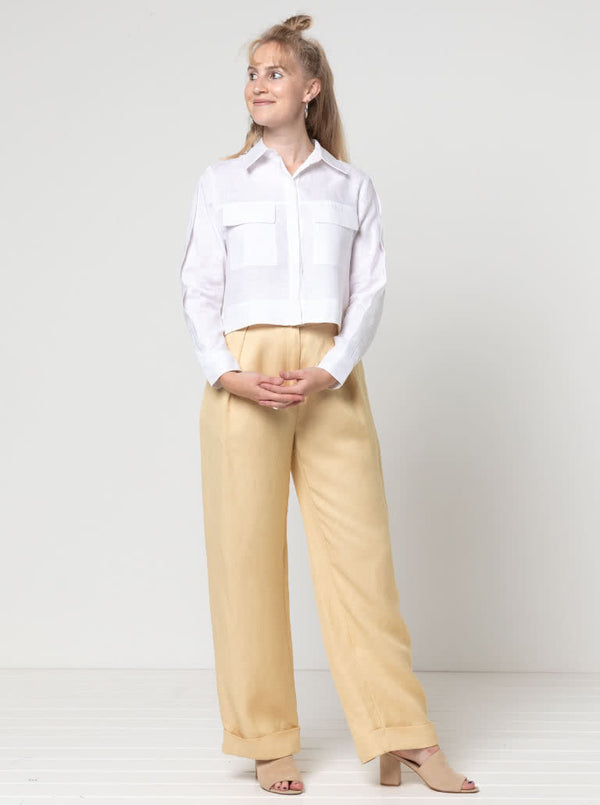 Spencer Woven Pant sewing pattern with wide leg design, cuffed hem, and detailed pockets, ideal for linen, wool, crepe, or gabardine fabrics.