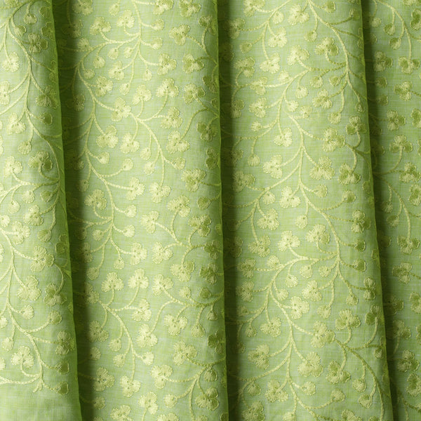 legant Sunny Lime Embroidered linen fabric with a chambray texture and green vine embroidery, ideal for sophisticated creations.