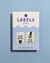 Pack of labels with humorous designs on a blue background
