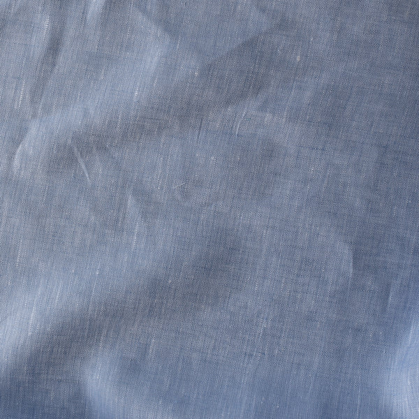 Blue Sky 100% Linen Fabric – chambray weave in dusty blue with fine texture