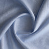 Blue Sky 100% Linen Fabric – chambray weave in dusty blue with fine texture