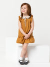 A child wearing dress made using Bonnie Kids Dress Sewing Pattern - A-line swing dress with frill hem and sleeves, Peter Pan collar, for kids ages 2-14, suitable for woven fabrics like linen, cotton, and rayon