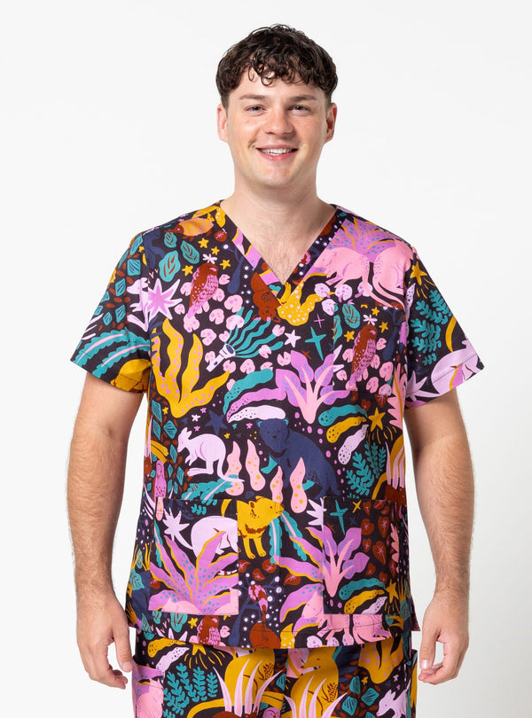 Person wearing a colorful patterned shirt on a white background