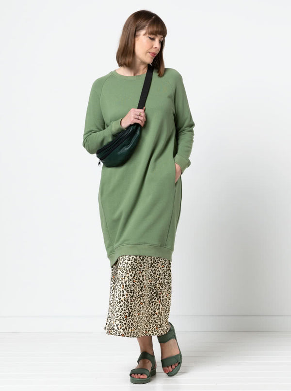 Lady wearing a Genoa Bias Cut Skirt made using the Genoa Bias Cut Skirt sewing pattern, in animal print fabric, pull-on elastic waist, ankle-length design.