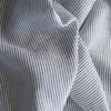Graphite Stripe Linen Fabric – yarn-dyed deep grey stripes on crisp white background
