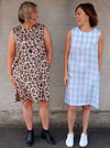 June Sheath Dress sewing pattern, featuring a sleeveless slip-on design with a very slight A-line shape and inseam pockets, suitable for crepe, linen, rayon, cotton, and brocade fabrics.