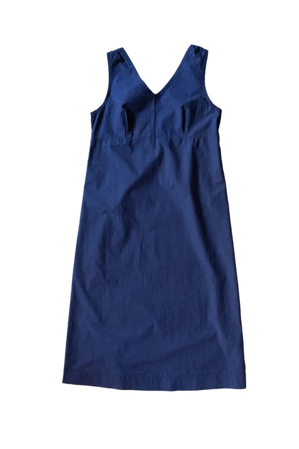 Blue dress made using The Lilian Sewing Pattern by Merchant & Mills on a white background