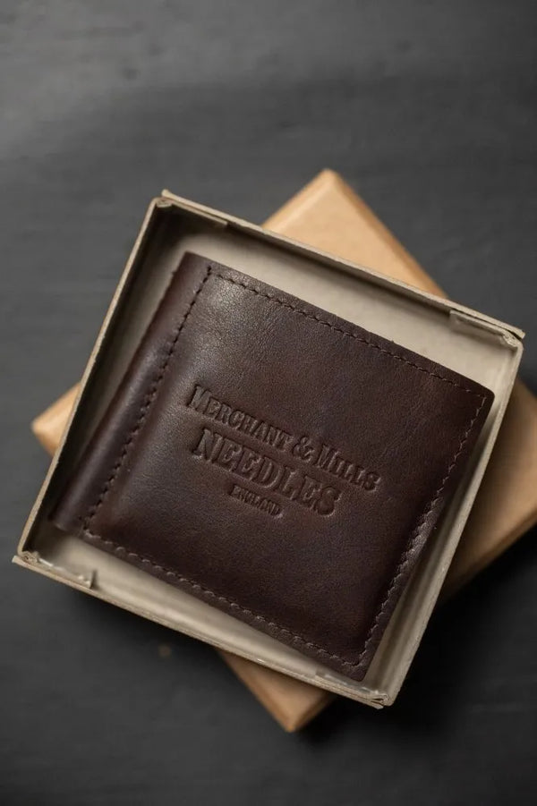 Merchant & Mills Leather Needle Wallet with premium needles and baby bow scissors for mending on the go