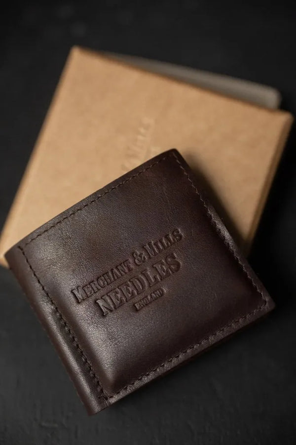 Merchant & Mills Leather Needle Wallet with premium needles and baby bow scissors for mending on the go