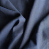 Midnight Chambray Linen Fabric – yarn-dyed black on navy chambray weave with soft texture