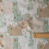 Ornate Harmony Linen Blend Fabric – geometric & floral pattern in earthy moss, aqua & olive tones, lightweight 140 GSM