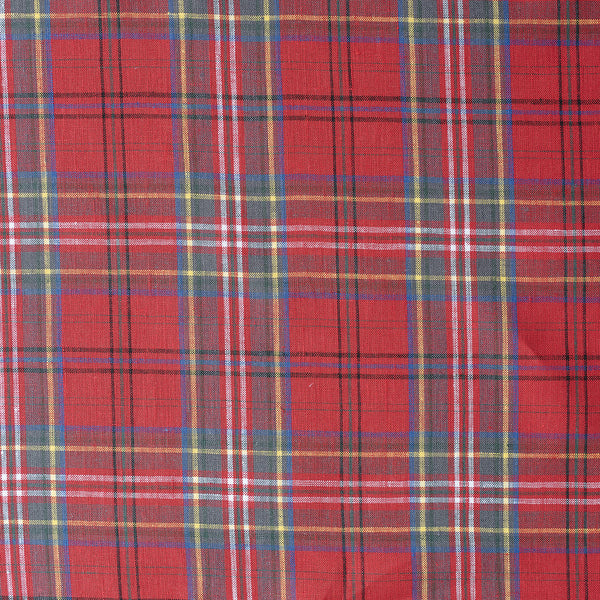Close-up of Outback Tartan Linen fabric showcasing a vibrant red, green, blue, and yellow plaid pattern, suitable for sewing garments and home textiles.