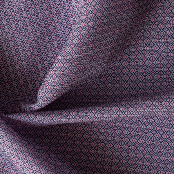 Petite Rosette Tile navy and red small-scale printed linen–cotton fabric, 136 GSM.