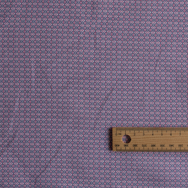 Petite Rosette Tile navy and red small-scale printed linen–cotton fabric, 136 GSM.