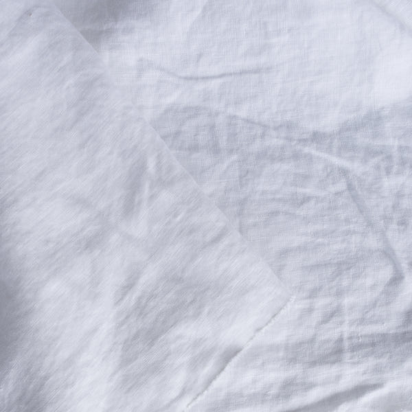 Close-up of white linen fabric texture