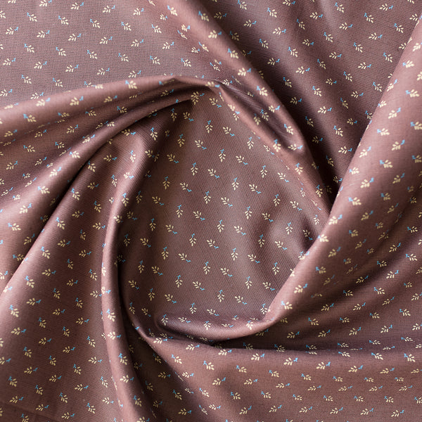 Rustic Meadow linen cotton blend fabric with brown base and green olive leaves and blue stems floral