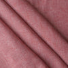 Close-up of Rustic Rose textured linen fabric in earthy rose-pink, 100% linen yarn dyed, 225 GSM, 25 LEA.