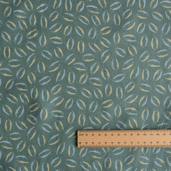 Sage Coast Print linen fabric with small botanical leaf motifs on a muted blue–green base