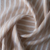 Salt & Sand Stripe herringbone linen – beige textured herringbone weave with white vertical stripes, lightweight linen for garments.