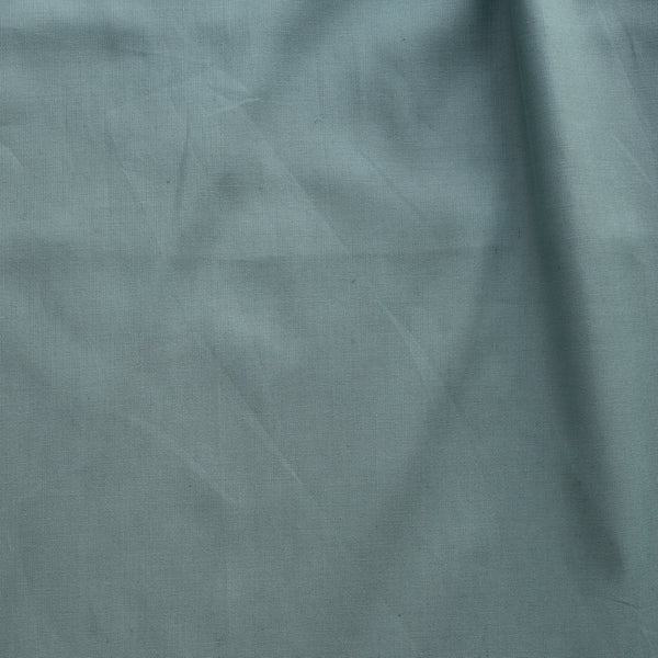 Close-up of textured teal fabric