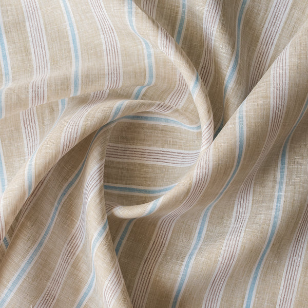 Close-up of Seagrass Pinstripe linen fabric with pale sage-beige base, light-brown pinstripes, white and blue accents, 100% linen, 130 GSM, 60 LEA