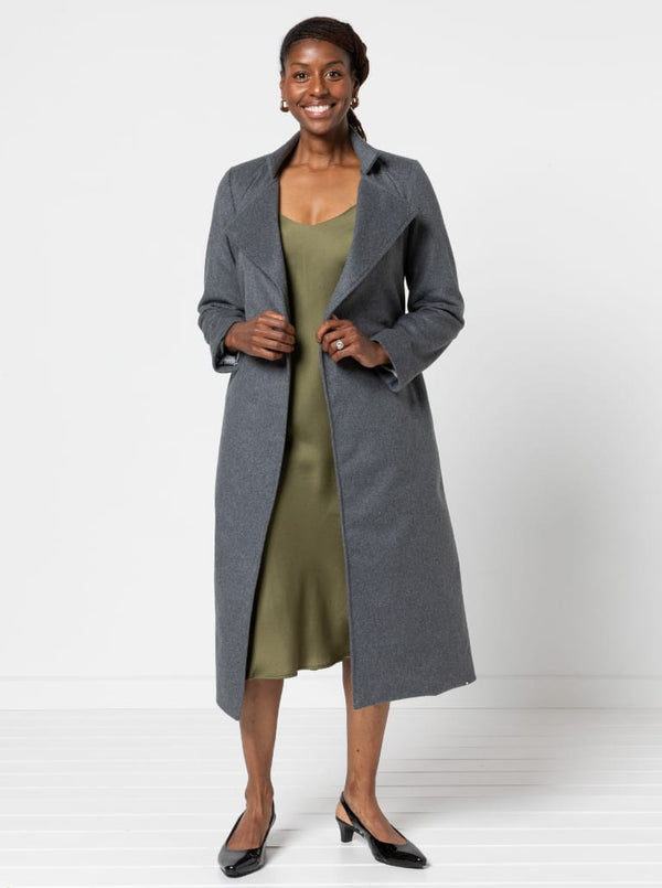 Stella Woven Coat Sewing Pattern - mid-length wrap coat with long sleeves, tie belt, revere and stand collar, fully lined, panelled back with yoke, in-seam pockets, and back vent