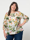 front view of Style Arc Anita Peasant Blouse Sewing Pattern with drawstring neck and raglan sleeves