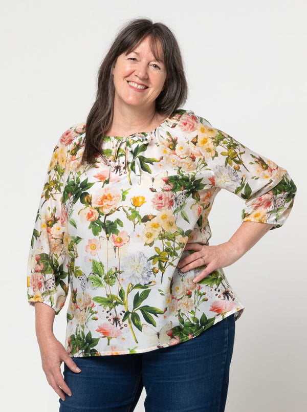 front view of Style Arc Anita Peasant Blouse Sewing Pattern with drawstring neck and raglan sleeves