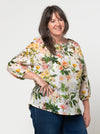 front view of Style Arc Anita Peasant Blouse Sewing Pattern with drawstring neck and raglan sleeves