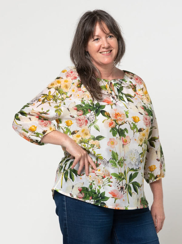 front view of Style Arc Anita Peasant Blouse Sewing Pattern with drawstring neck and raglan sleeves