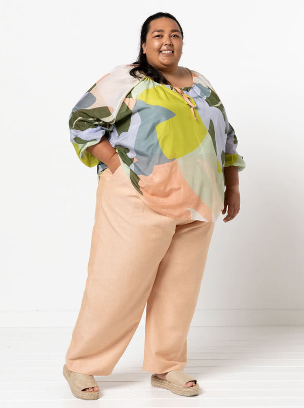 front view of Style Arc Anita Peasant Blouse Sewing Pattern with drawstring neck and raglan sleeves