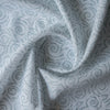 Tidal Whirl 100% linen fabric with soft blue-grey swirling coastal print