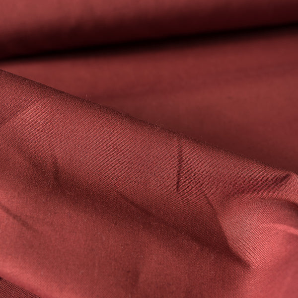 Elegant Wine Red Linen-Cotton Blend Fabric, lightweight and perfect for versatile design projects.
