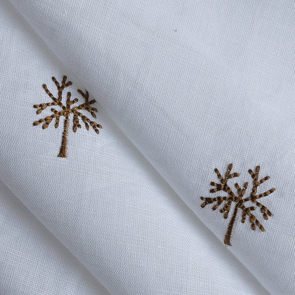 Wintertree Embroidery — pure white linen–cotton fabric with dark golden embroidered tree motif, 44 LEA