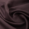 Deep brown-purple 100% linen fabric, suitable for various sewing projects.