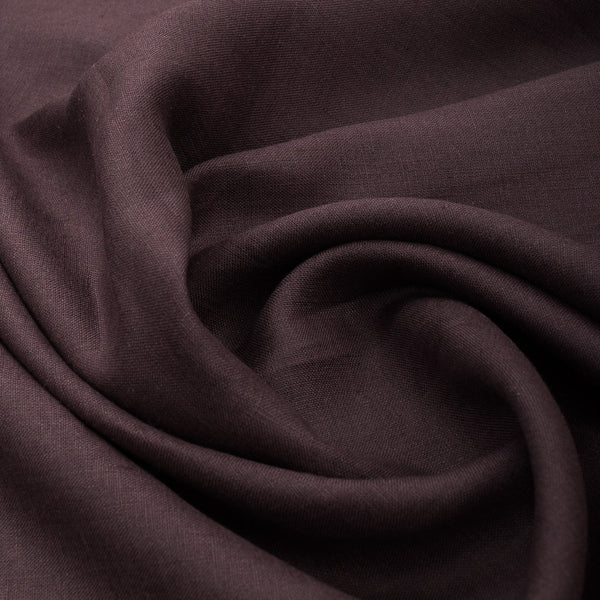 Deep brown-purple 100% linen fabric, suitable for various sewing projects.