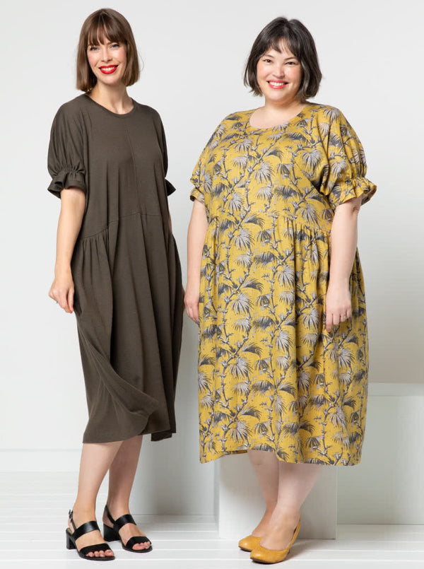 Elegant Eileen Dress pattern with shirred sleeve detail, gathered side waist, and round neckline, offering a blend of classic and modern style.