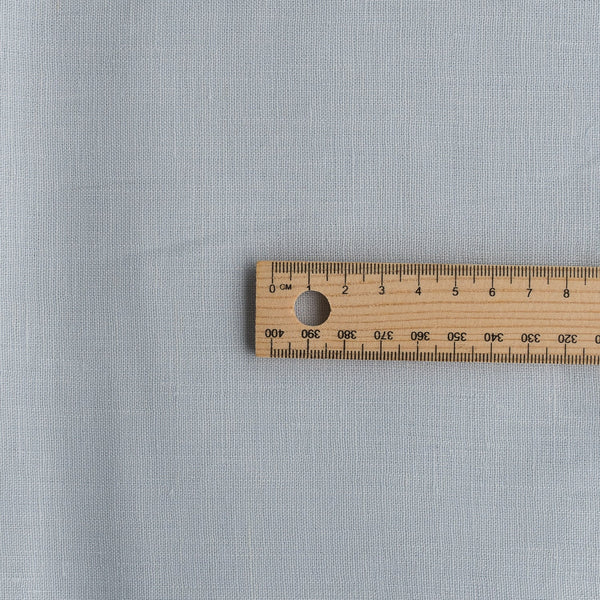 Very light washed blue linen fabric with a durable tight weave, ideal for summer garments