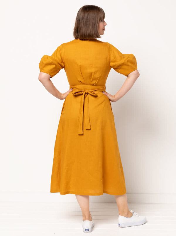 graceful Millicent wrap dress sewing pattern with a long wrap skirt and versatile sleeve options, perfect for creating a sophisticated garment in fine fabrics.