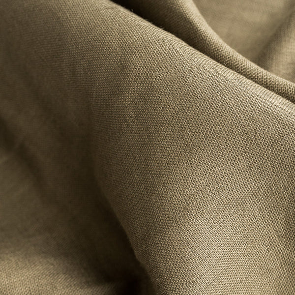 Earthy Norfolk Reed 100% Linen Fabric, featuring a mid-weight texture and natural linen grain, perfect for eco-conscious dressmaking and home decor.