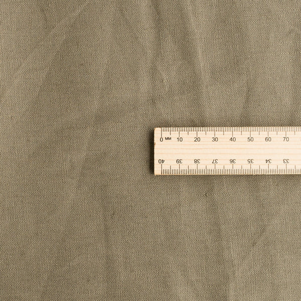 Earthy Norfolk Reed 100% Linen Fabric, featuring a mid-weight texture and natural linen grain, perfect for eco-conscious dressmaking and home decor.