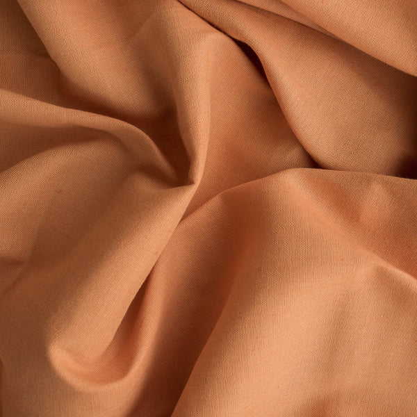 Peach Perfect Linen Blend Fabric with cotton and 2% spandex, perfect for comfortable and elegant summer dresses, tops, and skirts.