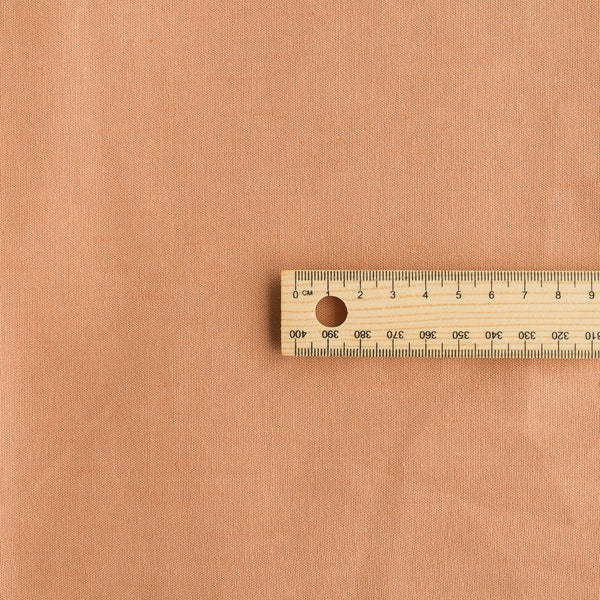 Peach Perfect Linen Blend Fabric with cotton and 2% spandex, perfect for comfortable and elegant summer dresses, tops, and skirts.