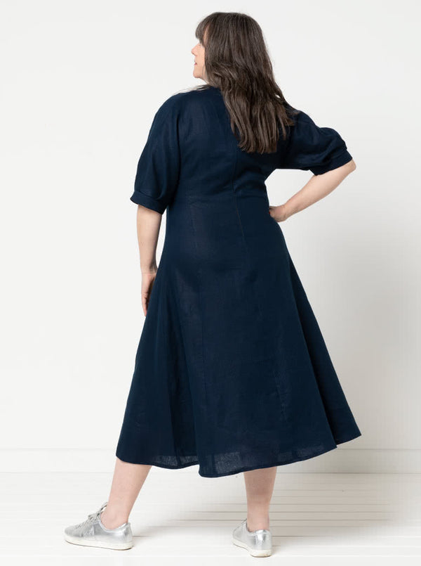 Elegant Penelope dress sewing pattern with a princess line, round neck, and unique elbow-length sleeves with tucks and gussets, suitable for silk, rayon, or linen