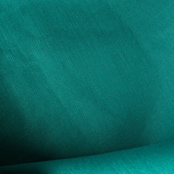 Persian Green 100% linen fabric, perfect for creating vibrant summer shirts, dresses, skirts, and loose pants.